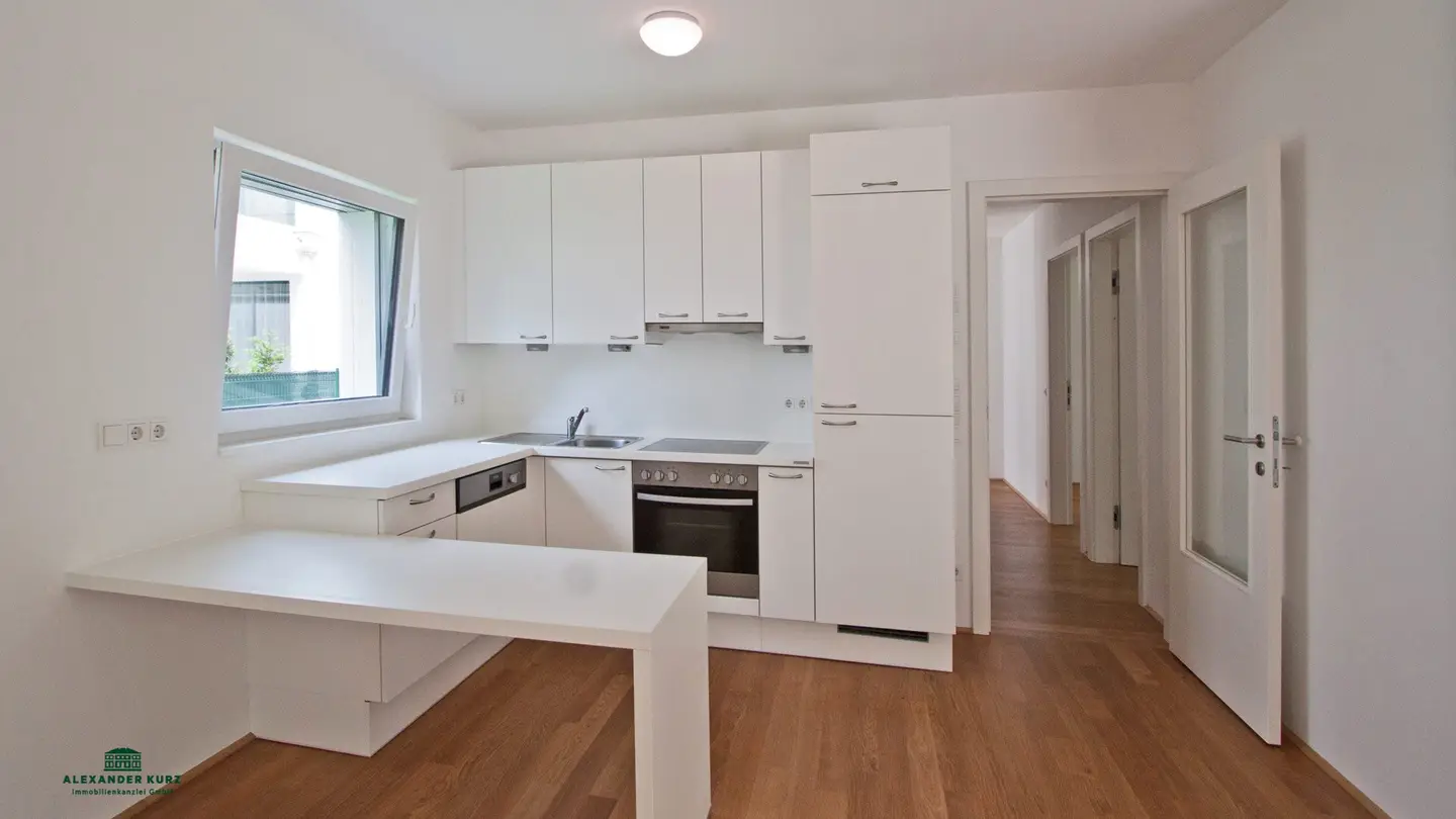 Moderne 3-Zimmer-Wohnung mit Terrasse und Garten - Immobilienkanzlei Alexander Kurz