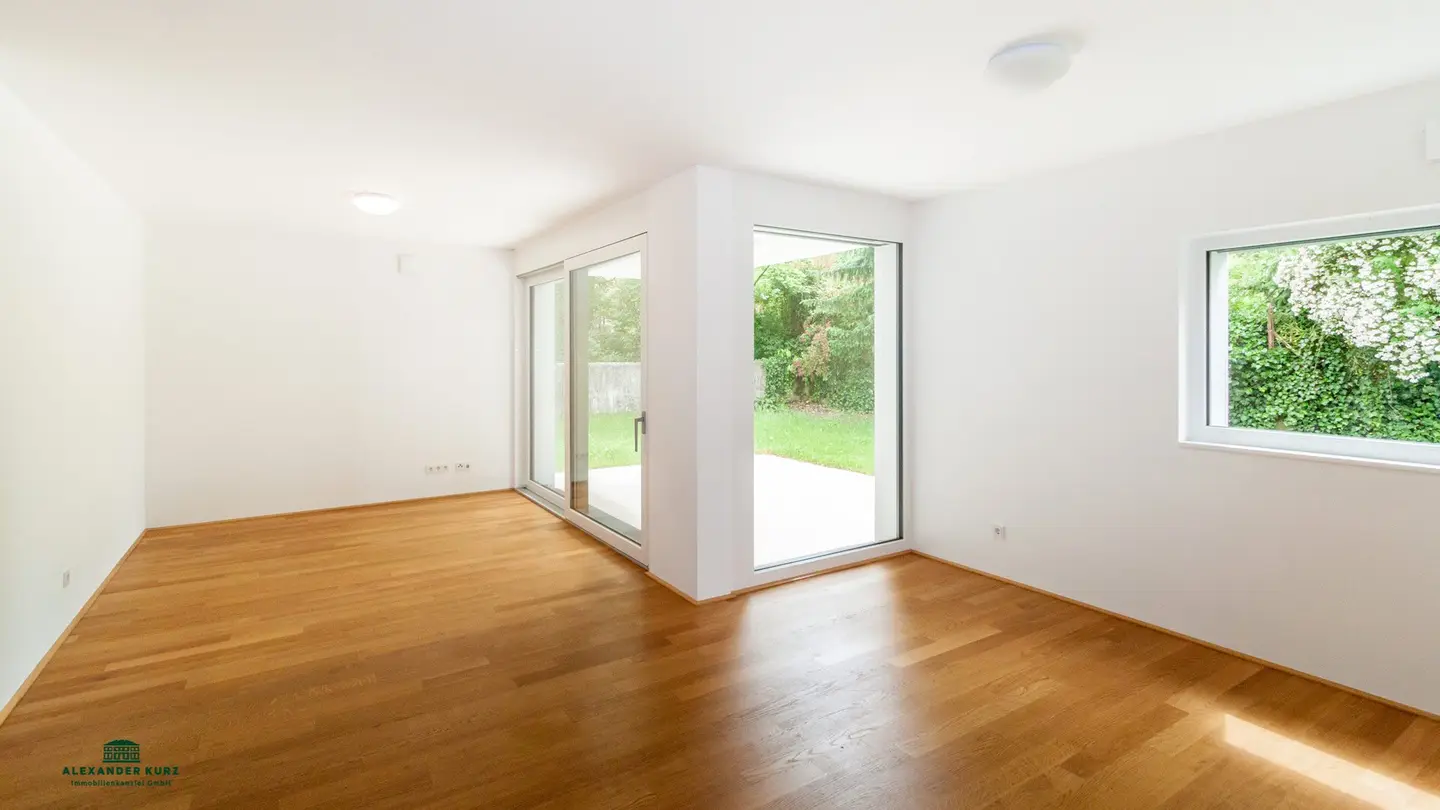 Moderne 3-Zimmer-Wohnung mit Terrasse und Garten - Immobilienkanzlei Alexander Kurz