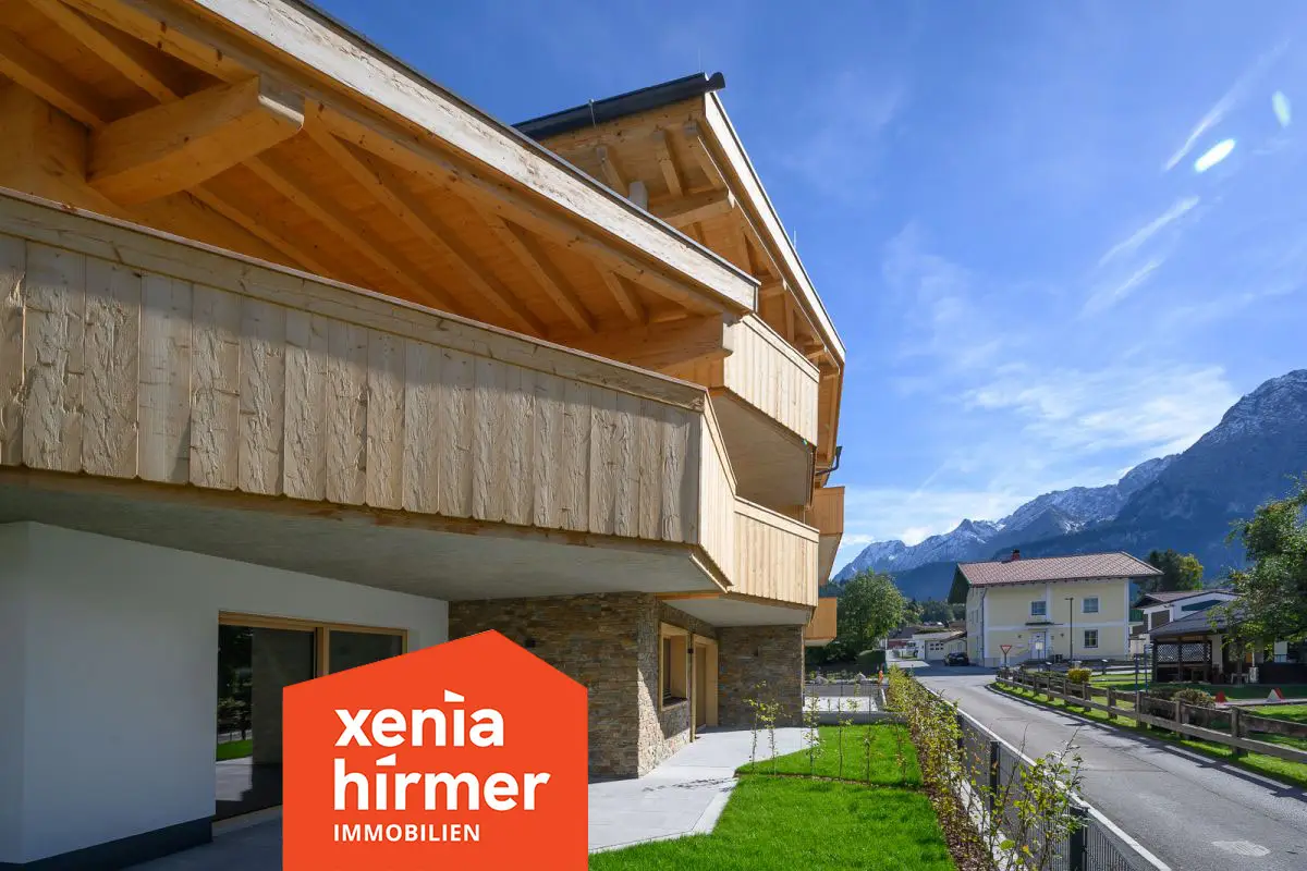 Erdgeschosswohnung mit Privatgarten und Bergblick