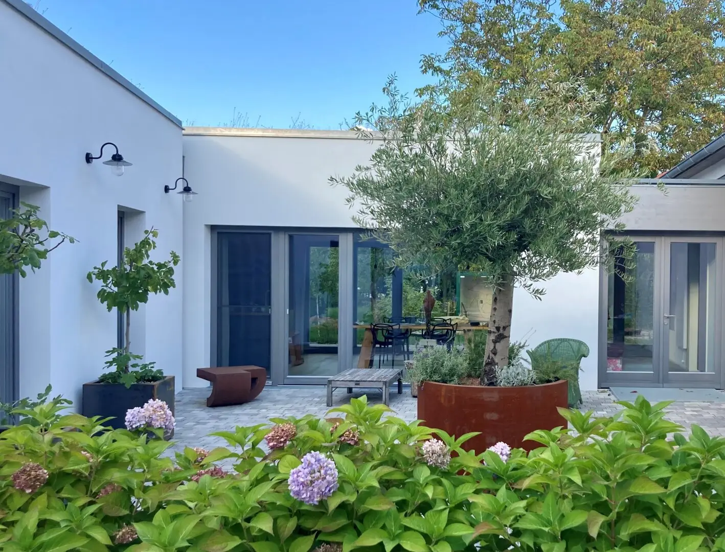 Four-sided farm planned, built, furnished by architects