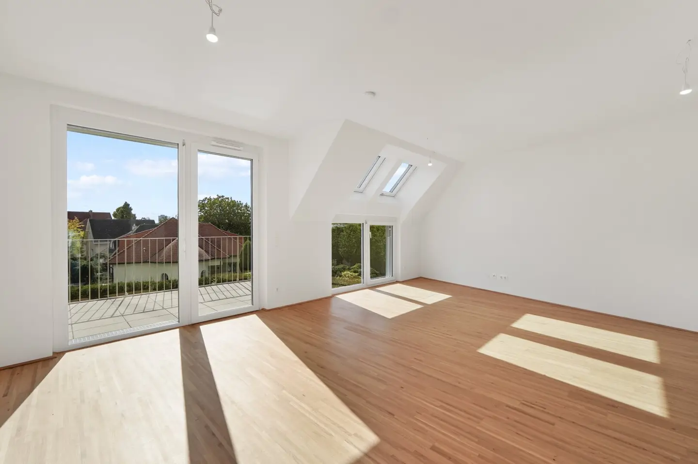 Modern first-occupancy rental apartments with private outdoor spaces and garage in the 21st district