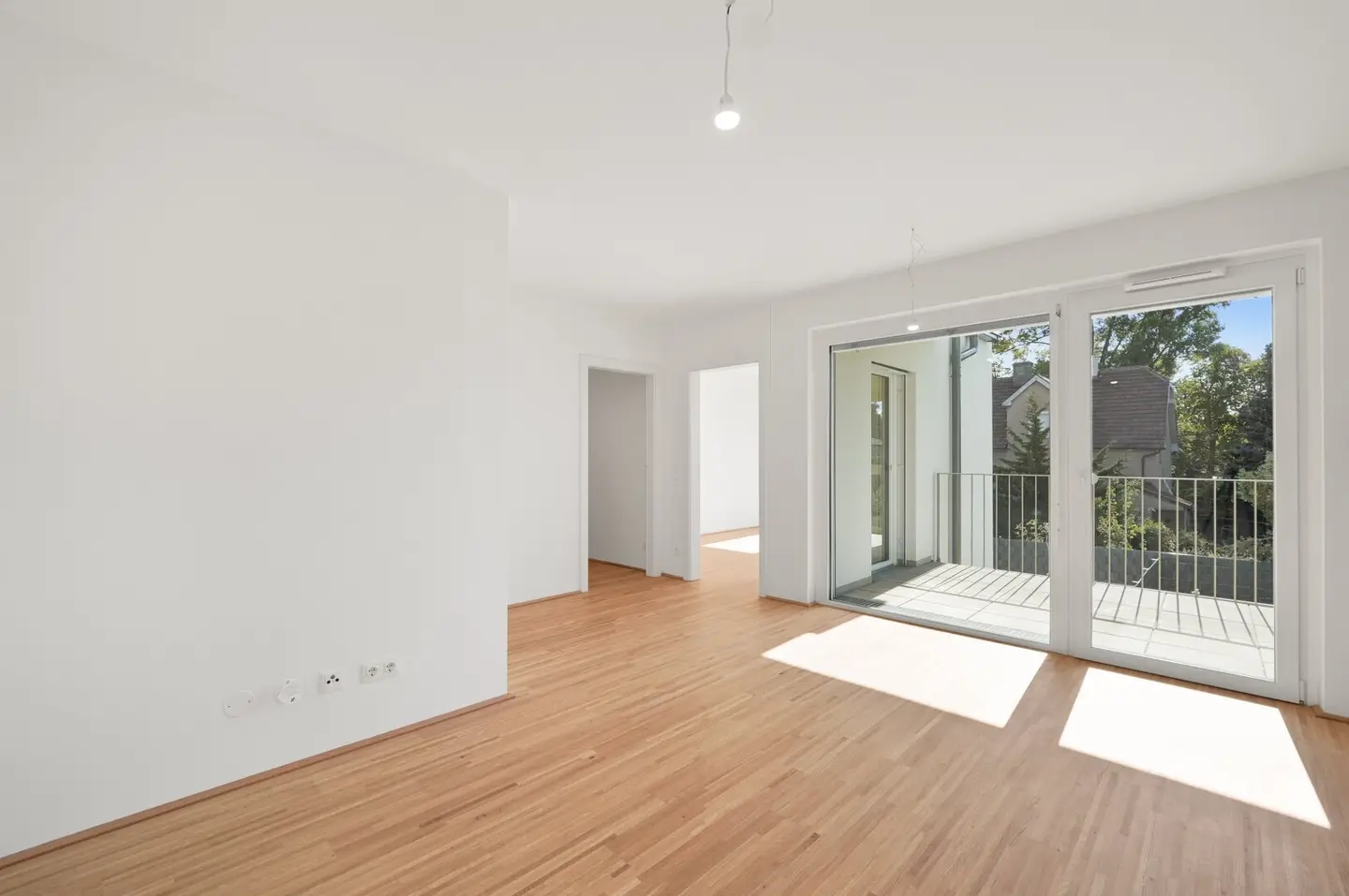 Modern first-occupancy rental apartments with private outdoor areas and garage in the 21st district