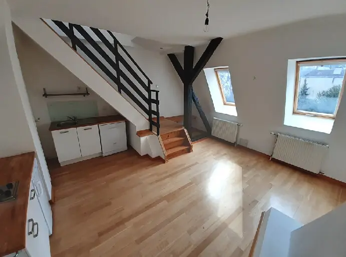 Charmante Maisonettewohnung mit Holzbalken und Kachelofen