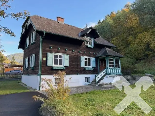Apartment in nature with double garage and large plot