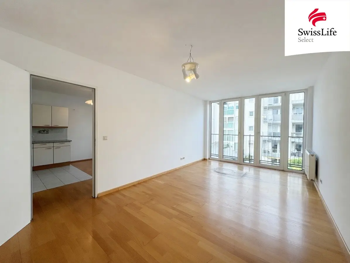 Schmucklos?  Ein wenig.  Chancenlos? Sicher nicht. |  ca. 61 m²  |  2 Zimmer  |  3. Liftstock  | Garage