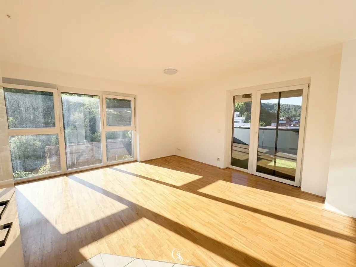 Exclusive three-room rental apartment with dreamlike west terrace and underground parking space