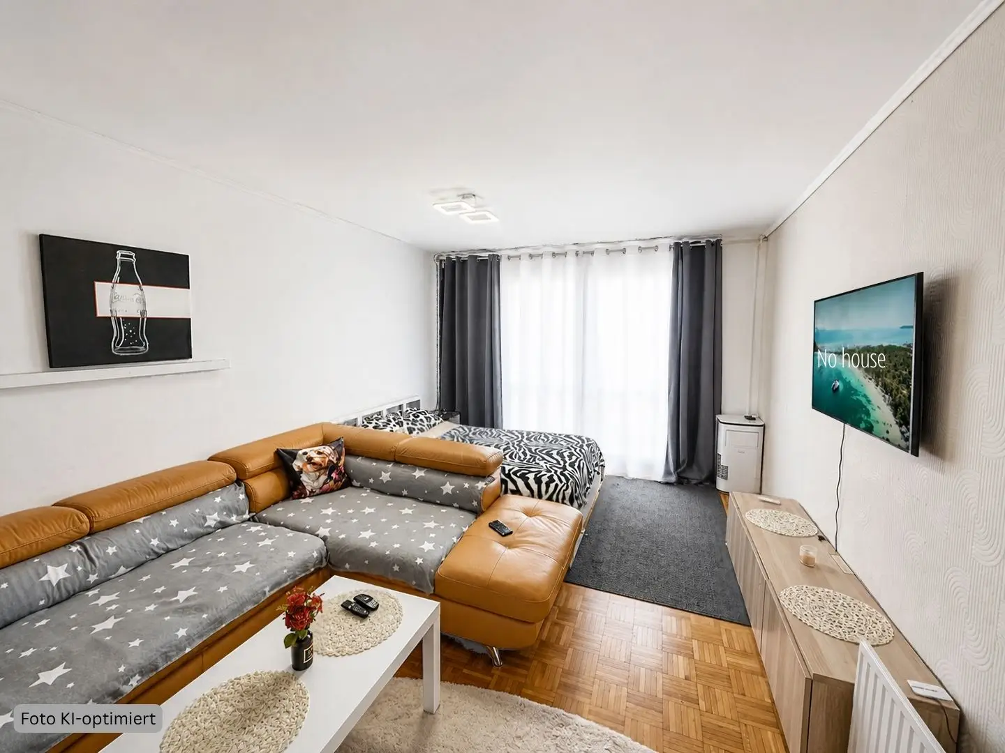 Helle Garçonnière mit überdachtem Balkon zentral gelegen