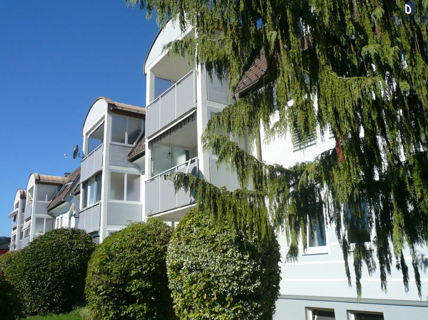 Sonnige Eigentumswohnung mit Loggia und Carport