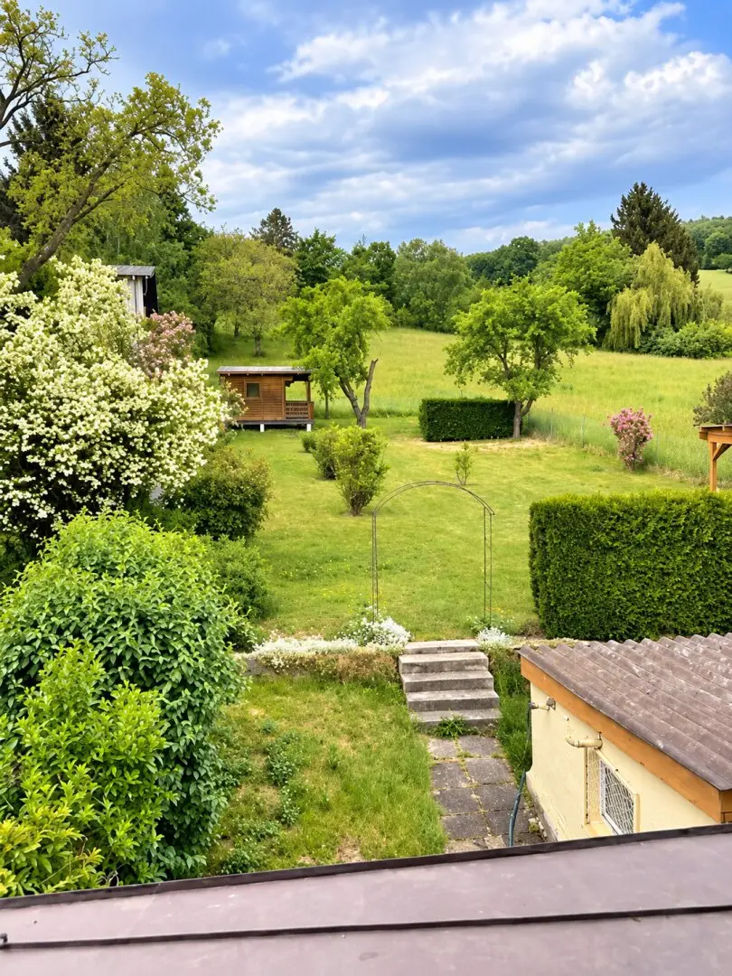 Wohnen mit Garten – Charmante Haushälfte mit besonderem Wohlfühlcharakter