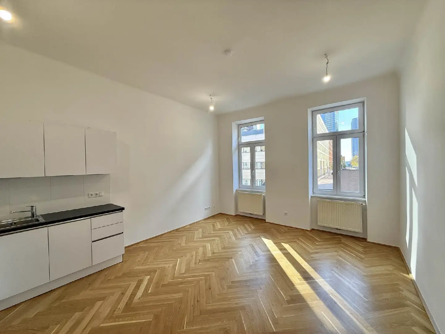 Modernisierte Wohnung mit großzügiger Wohnküche und Lift