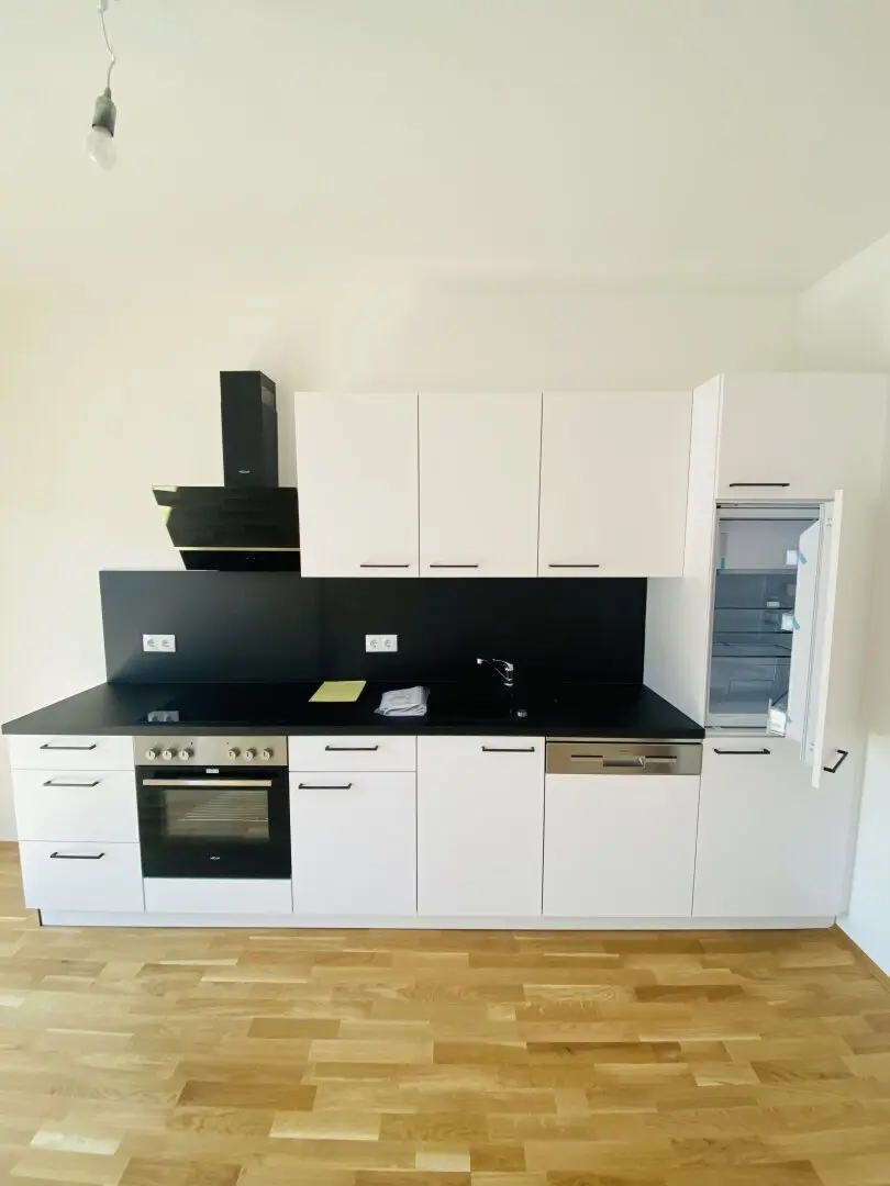 Neuwertige Erdgeschosswohnung mit Eigengarten und 2 Tiefgaragenparkplätzen in Kalsdorf