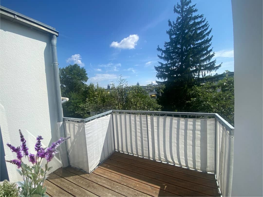 Dachgeschosswohnung mit Balkon und Tiefgaragenplatz