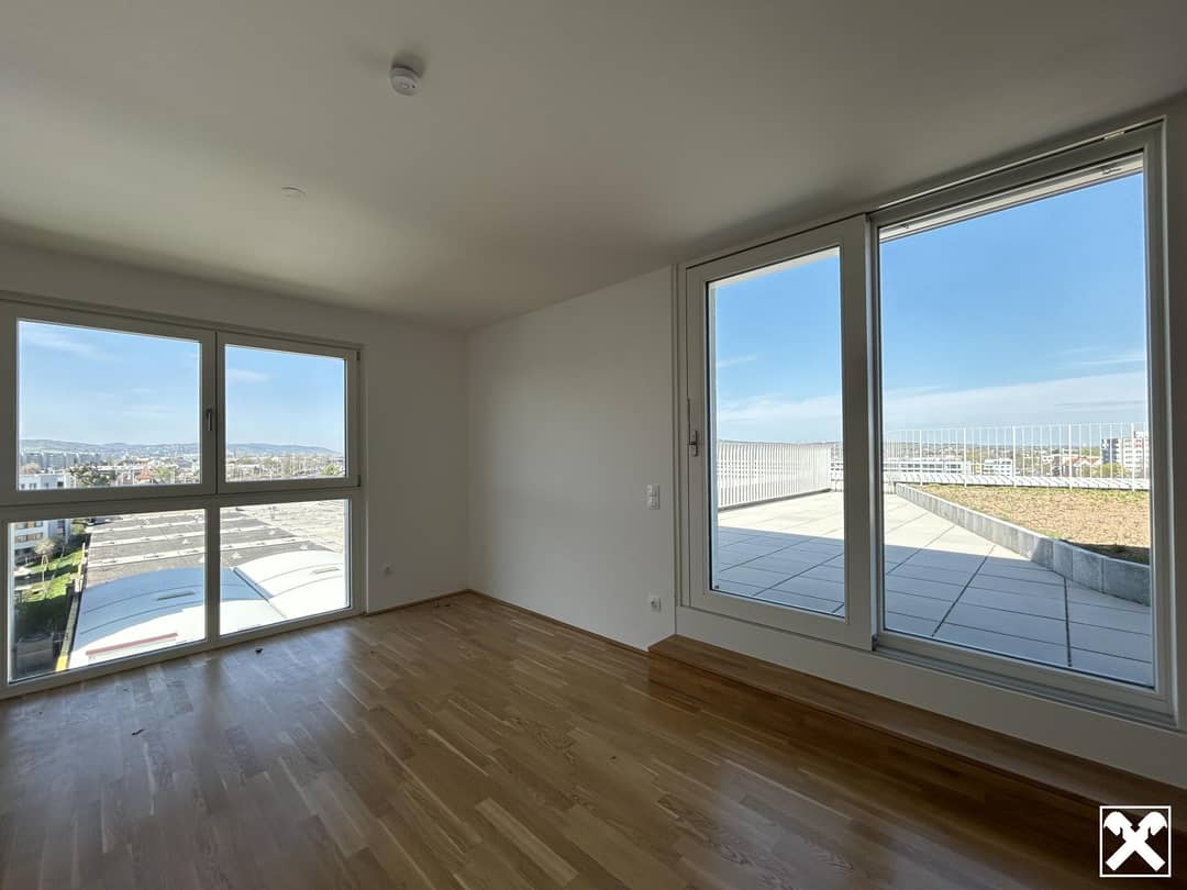Top floor apartment with rooftop garden and terrace in a new build