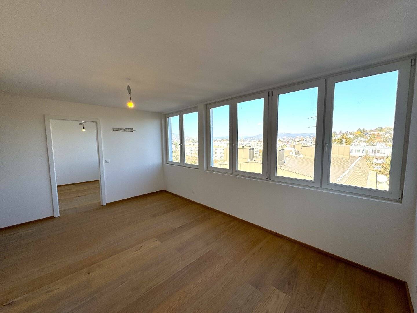 Exclusive attic conversion in elite location – Stylish penthouses above the roofs of the city!