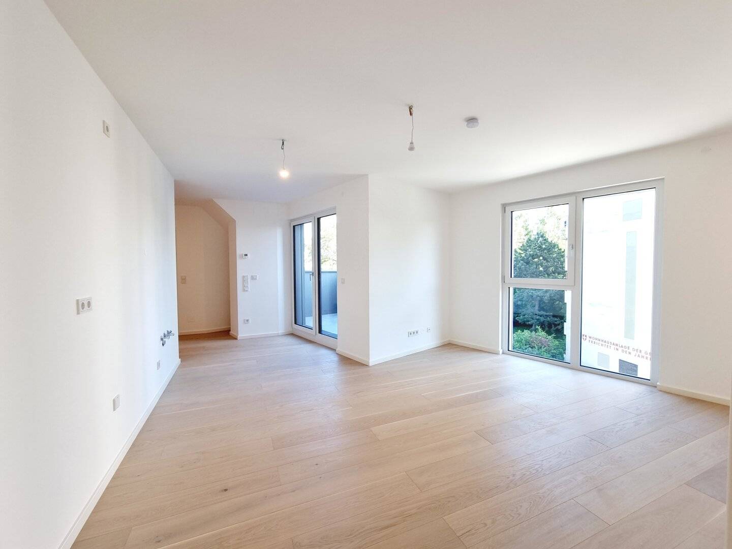 New Build with Outdoor Spaces and Underground Parking near the Old Danube