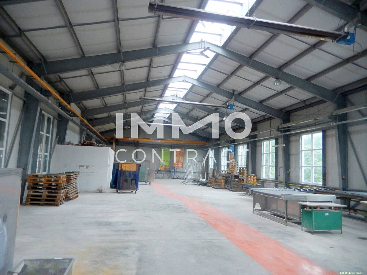 Loft apartment with heated storage hall and 6 m ceiling height