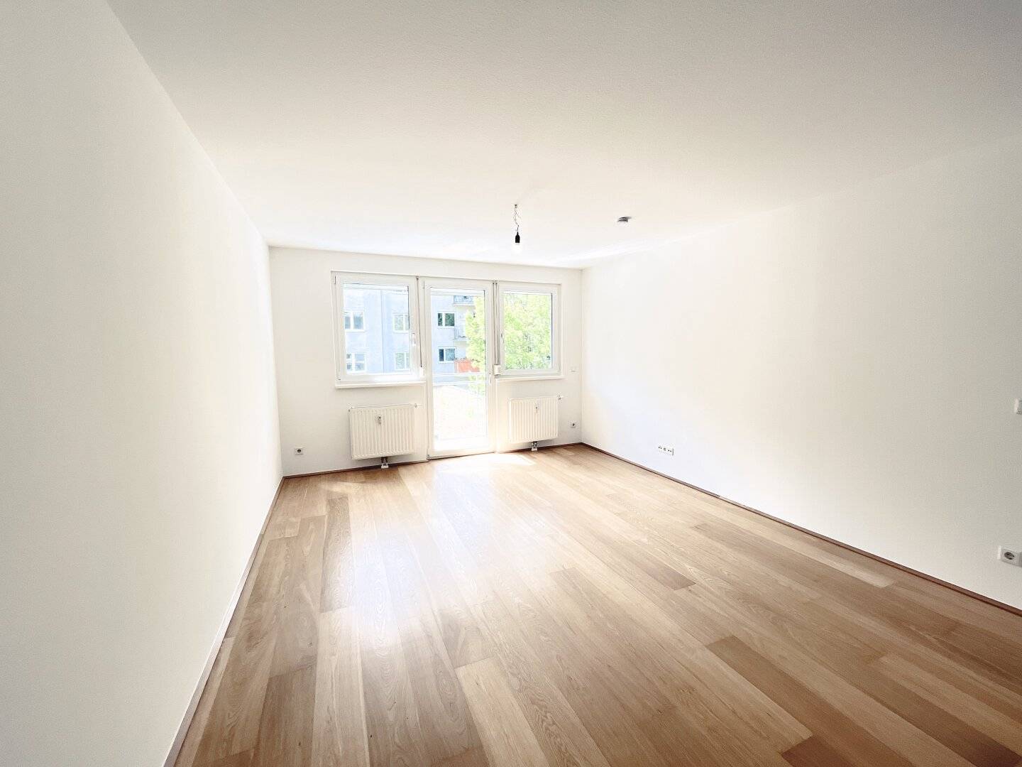 Neubau Wohnung mit Balkon und Wohnküche