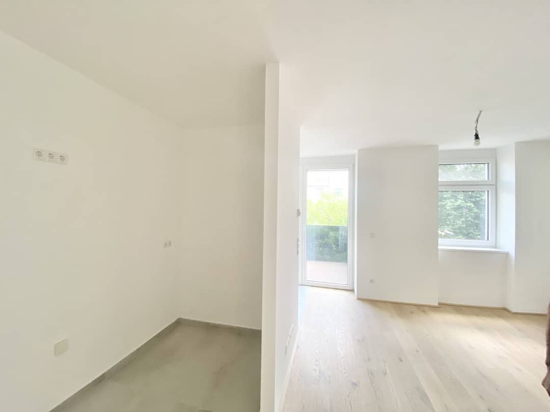 Wohnzimmer mit extra Nische für Küche