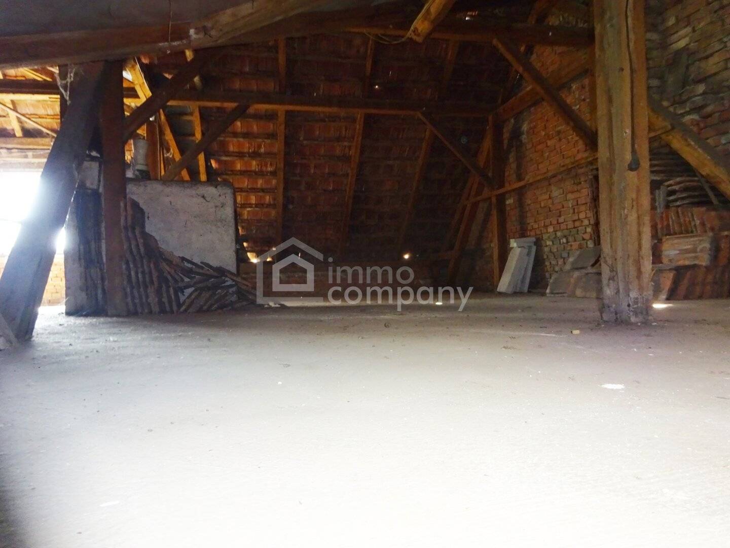 Abandoned former farm with barn