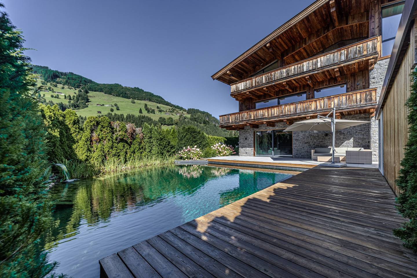 Apartment in Aurach near Kitzbühel with private swimming pond and terrace