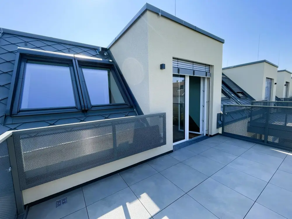 Dachgeschosswohnung mit Sonnenuntergangsbalkon