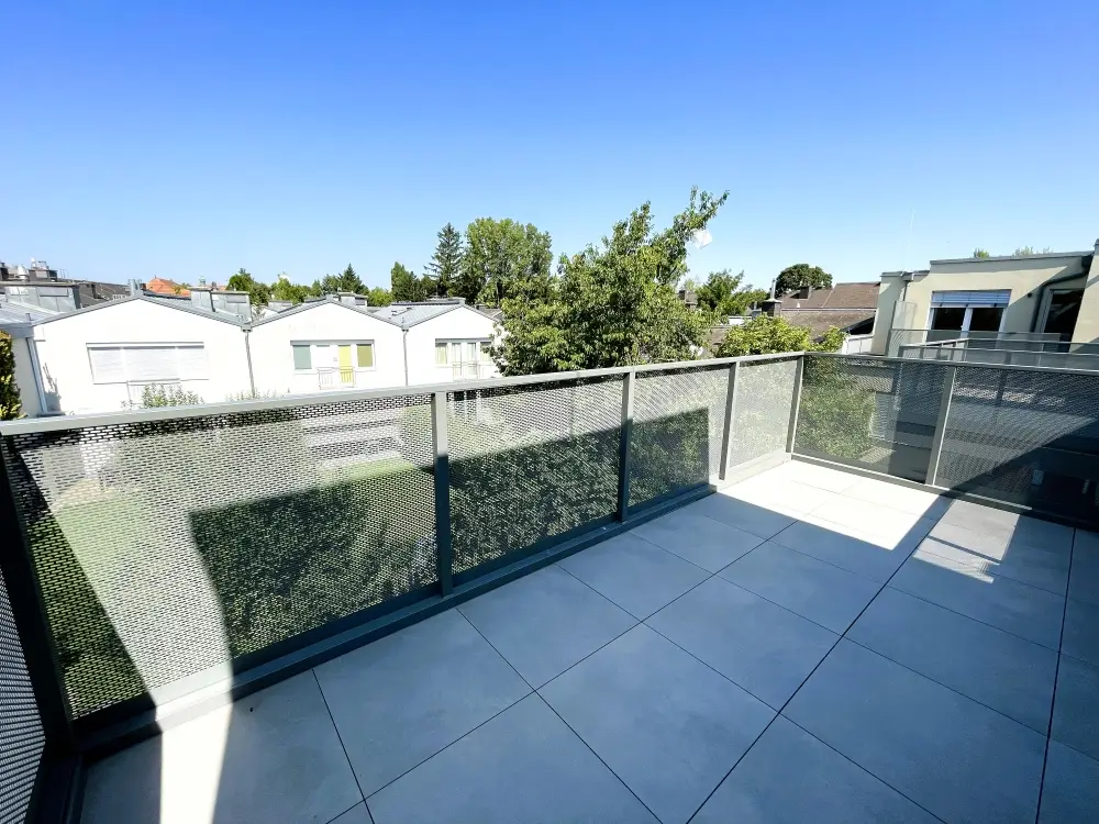 Dachgeschosswohnung mit Sonnenuntergangsbalkon