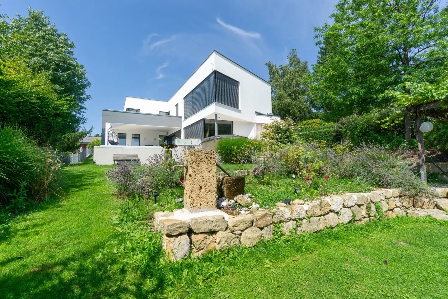 Luxury in the Green: Architect's Villa with Mediterranean Flair and Alpine Panorama