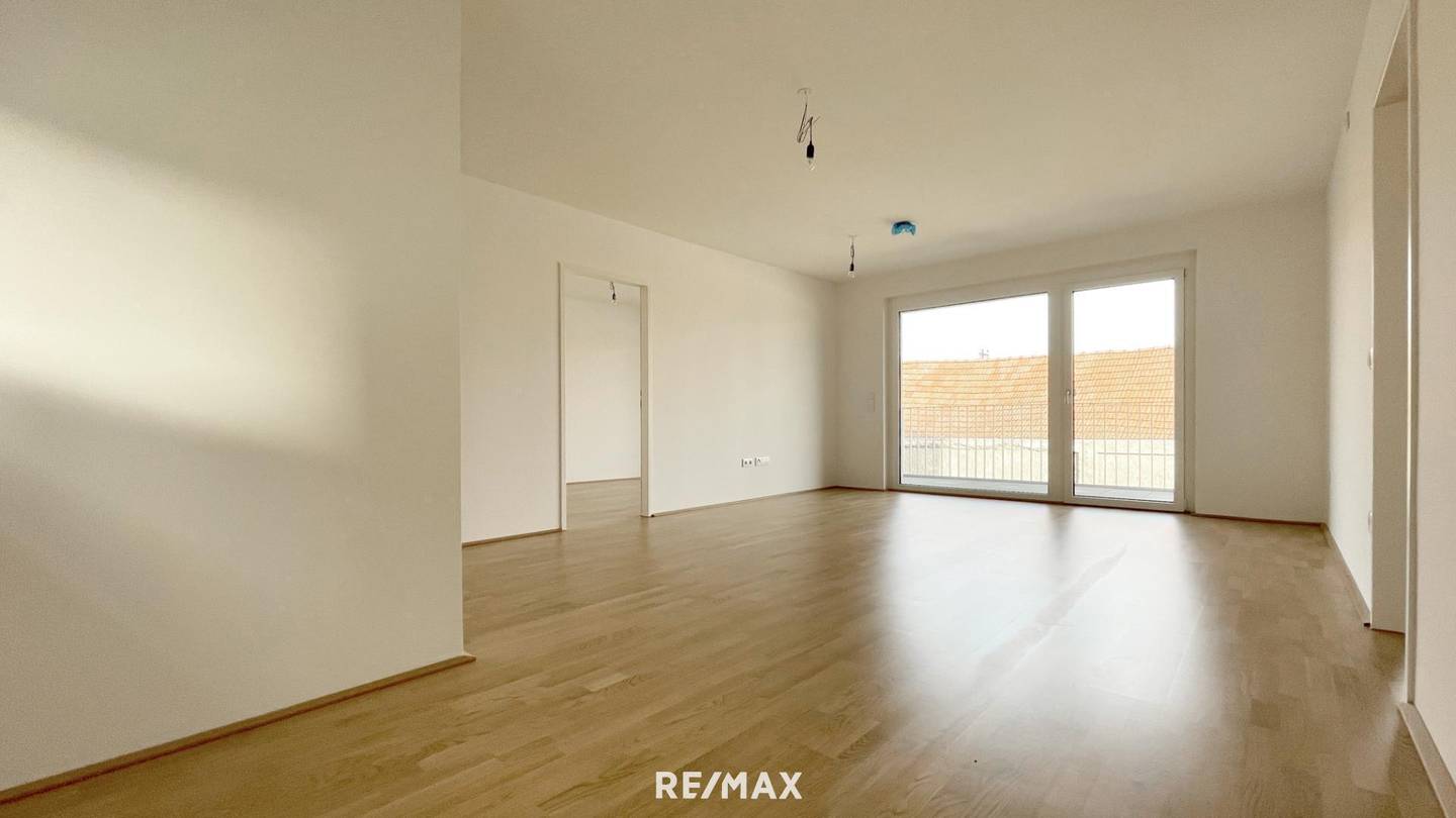 Newly built apartment with garden access in the village center