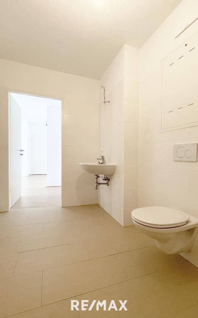 Newly built apartment with garden access in the village center
