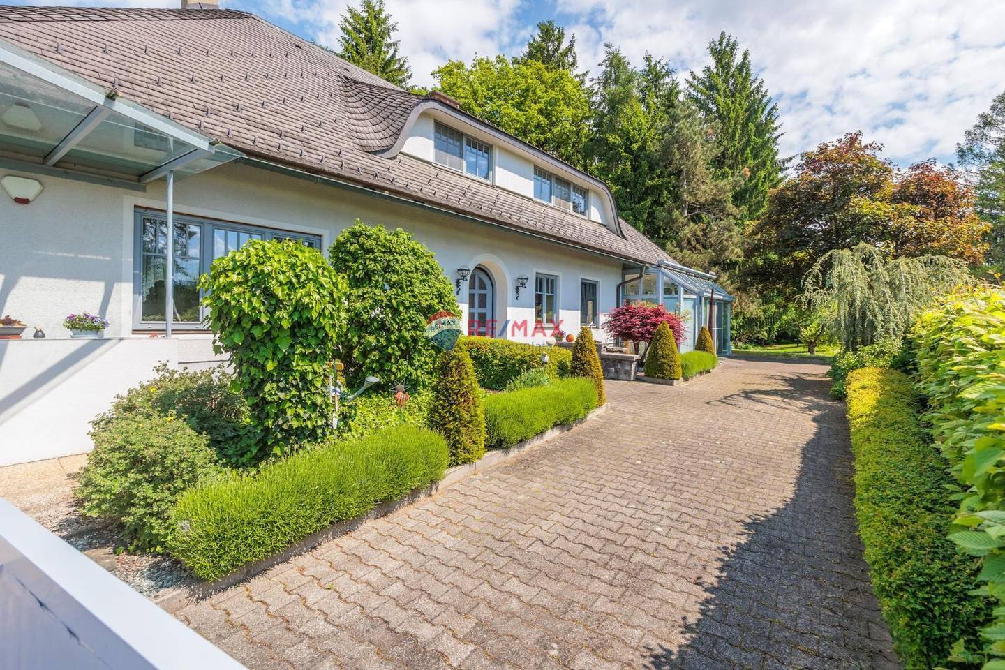 Einzigartige Liegenschaft mit Kachelofen, Wintergarten und parkähnlichen Grundstück in Toplage