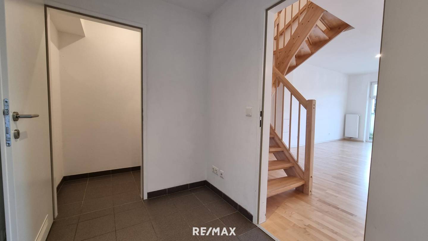 Maisonette apartment with balcony and two parking spaces