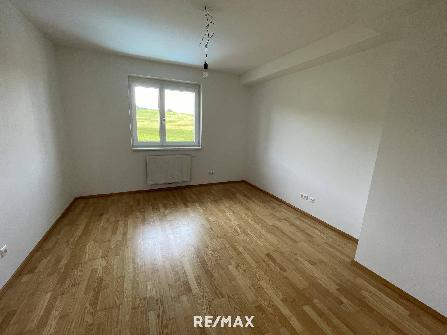 Apartment with balcony and pellet heating