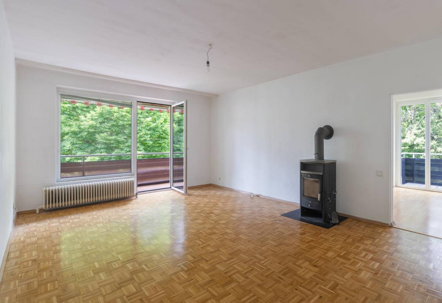 Wohnung mit Parkblick Loggia und Kaminofen