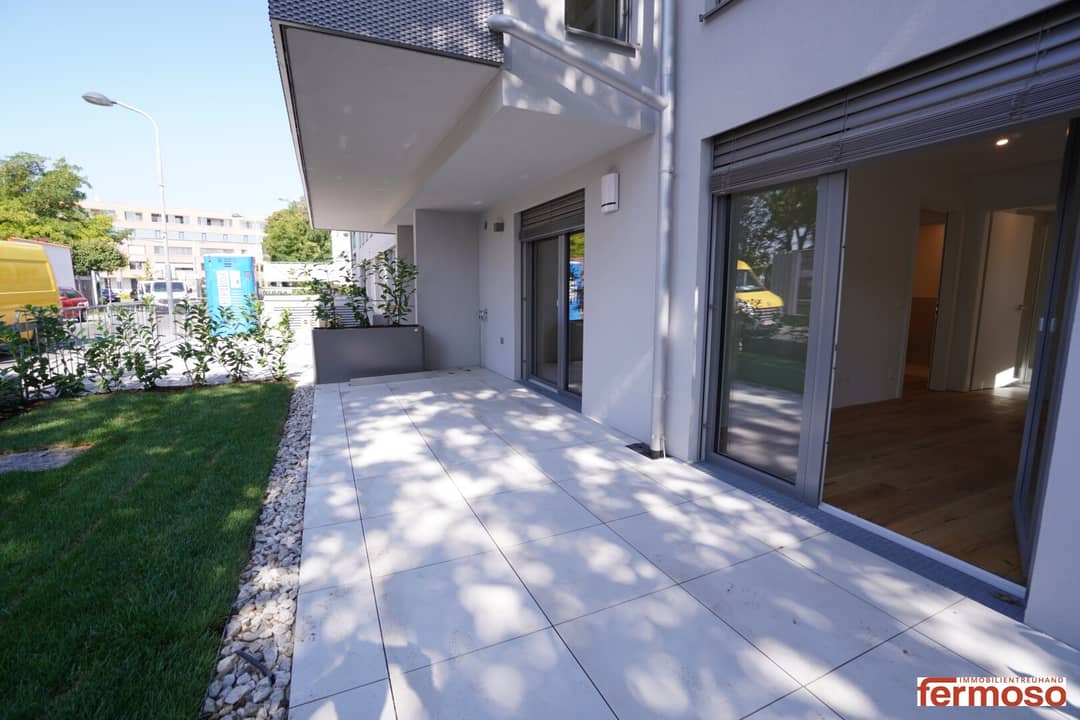 Neubauwohnung mit eigenem Garten und Terrasse