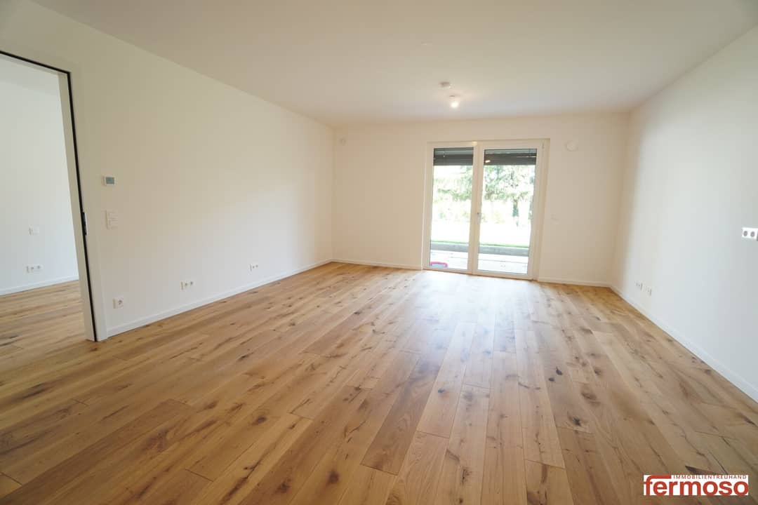 Neubauwohnung mit Garten und Terrasse