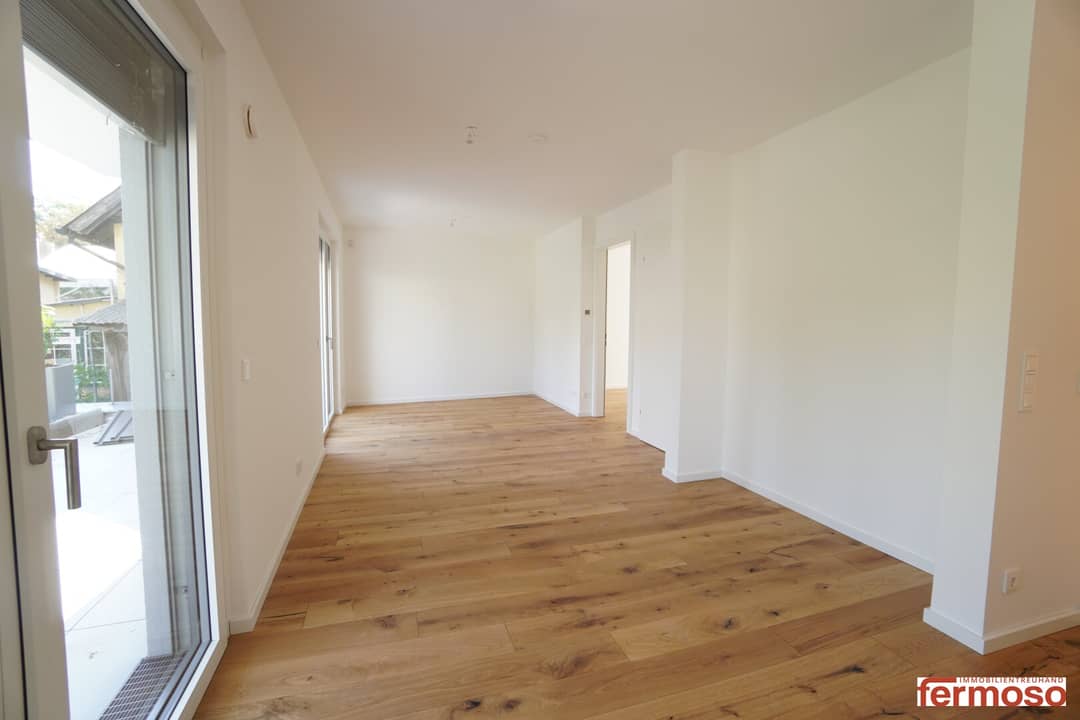 Wohnung mit zwei Gärten und offener Wohnküche