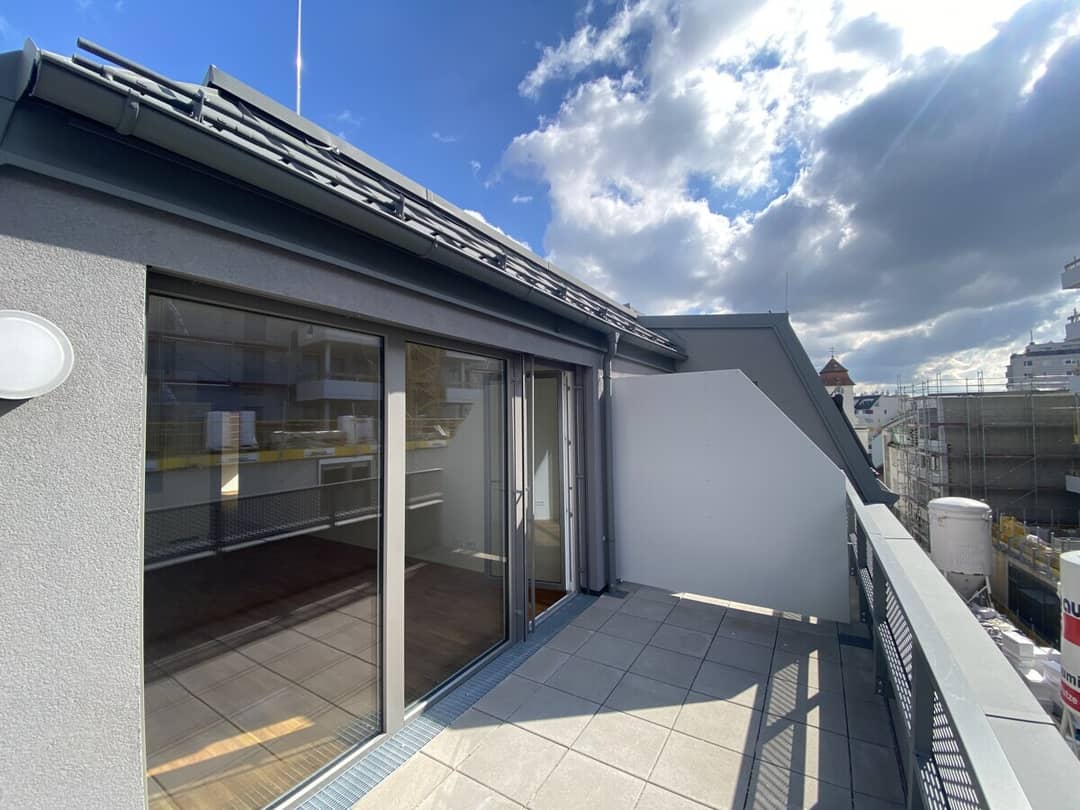 Dachterrasse mit Kirchturmblick