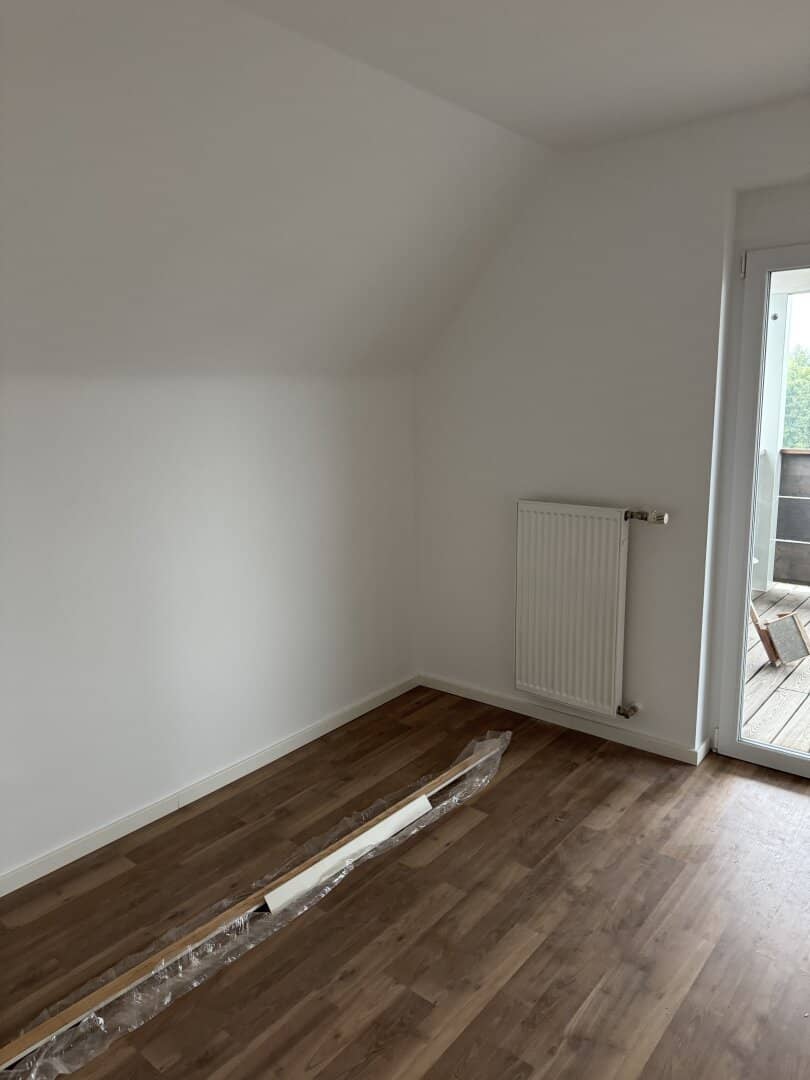 Vollsanierte Dachgeschosswohnung mit Privatgarten