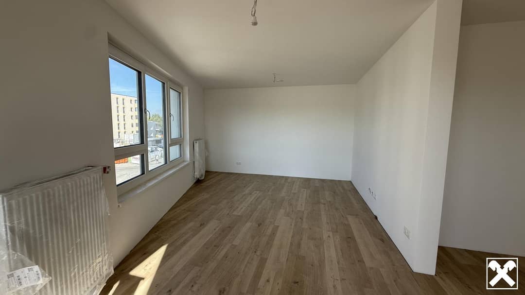 Wohnung im Neubauprojekt mit Balkon und Grünlage