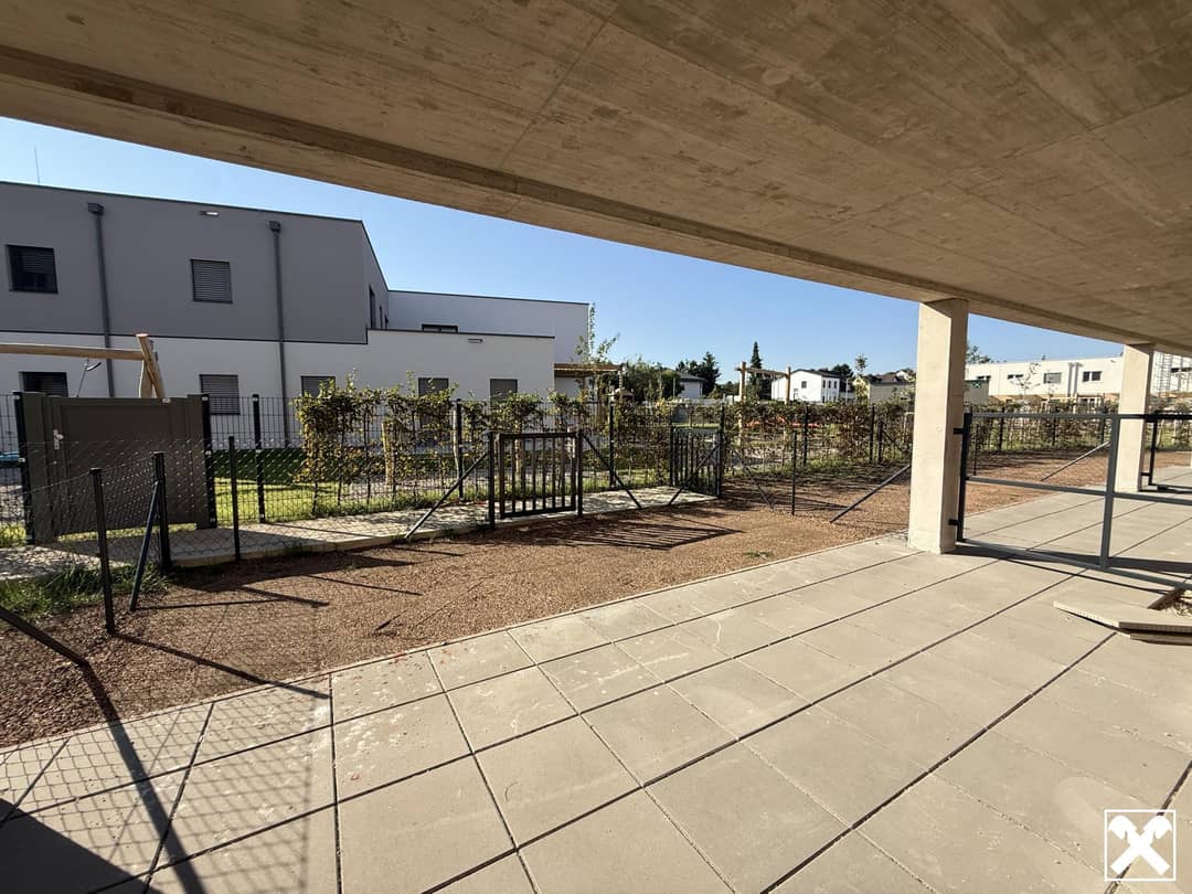 Neubauwohnung mit Terrasse und Garten