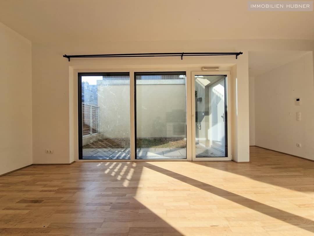 Wohnung Neubau mit kleinem Garten in ruhiger Lage