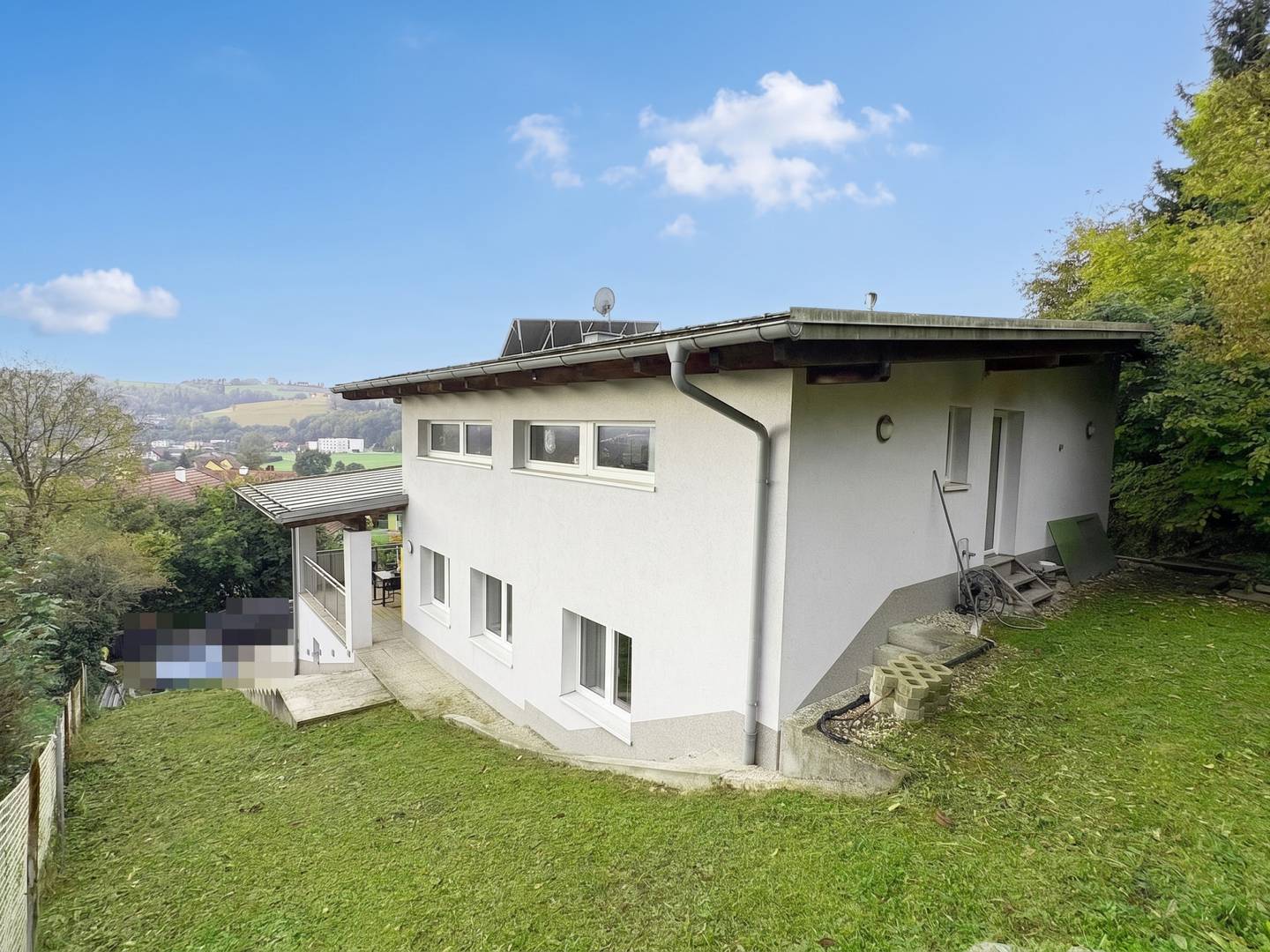 Einfamilienhaus in Hanglage mit Weitblick – Weinberglage Schlüßlberg