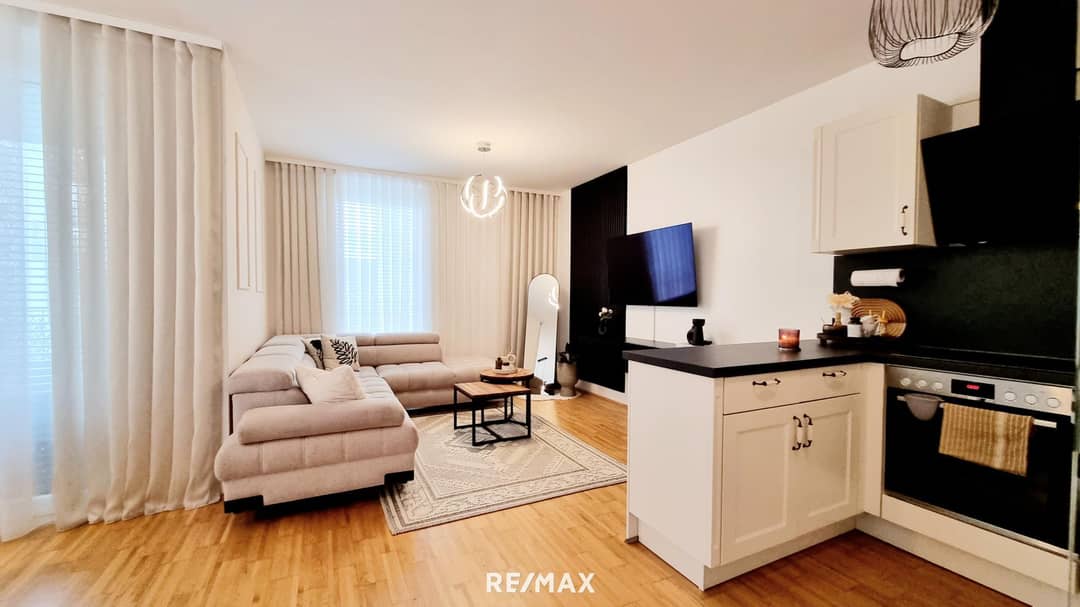 Nearly new four room apartment with loggia and underground parking