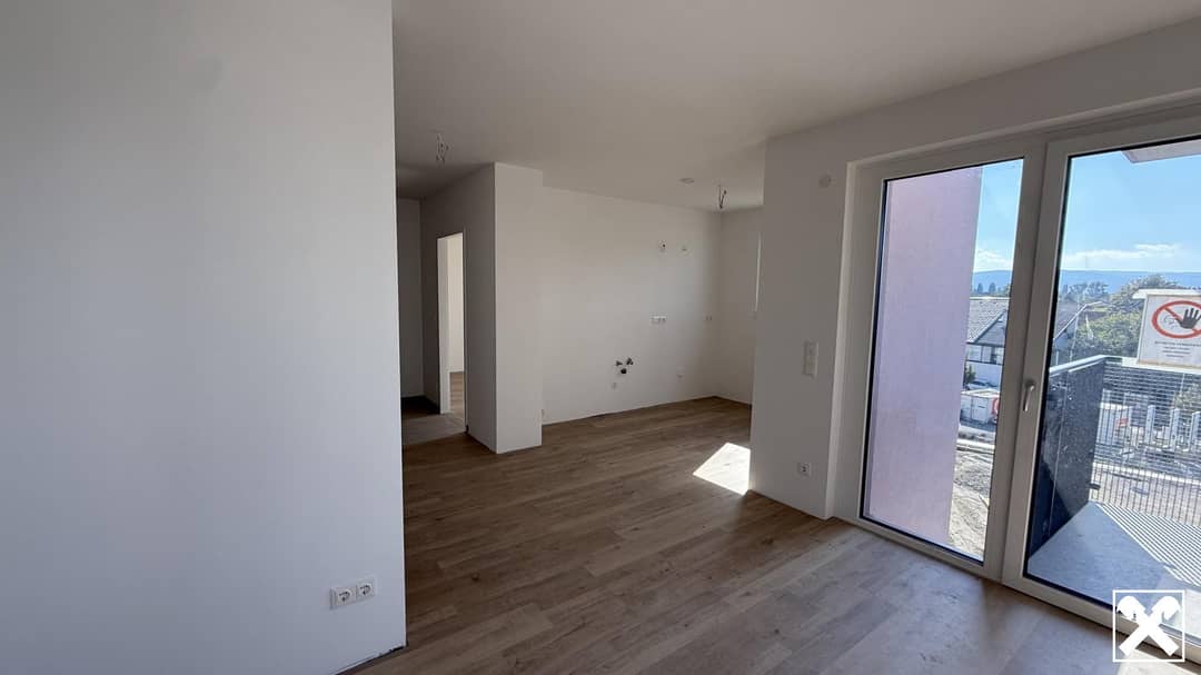 Haus_3_Top_12_Blick_auf_die_Küche_vom_Wohnbereich