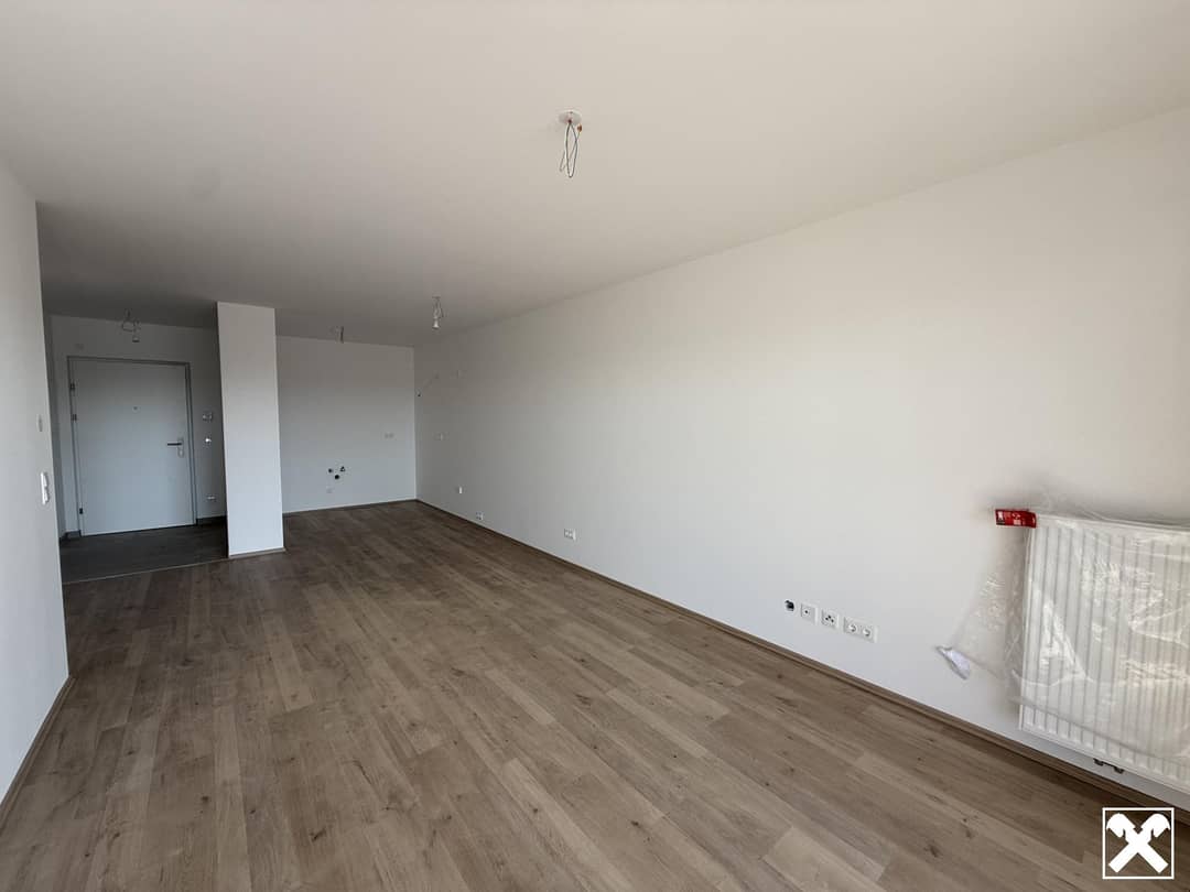 Haus_1_Top_14_Wohnbereich_mit_Blick_auf_Küche_