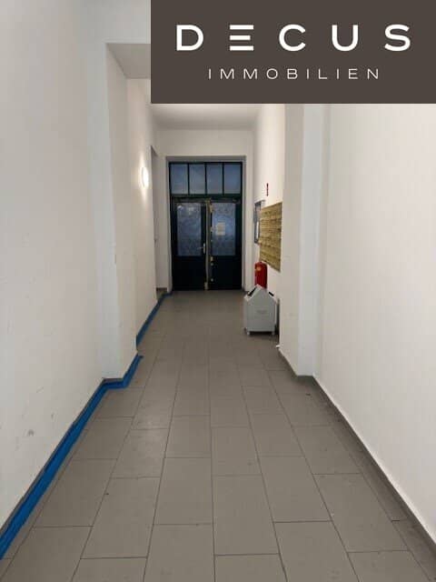 Raw attic space with expansion study near Augarten